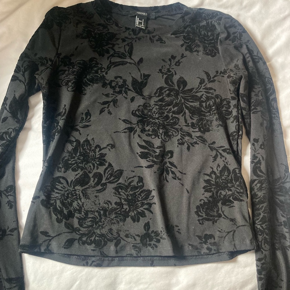 Black long sleeve tight top with floral velvet design